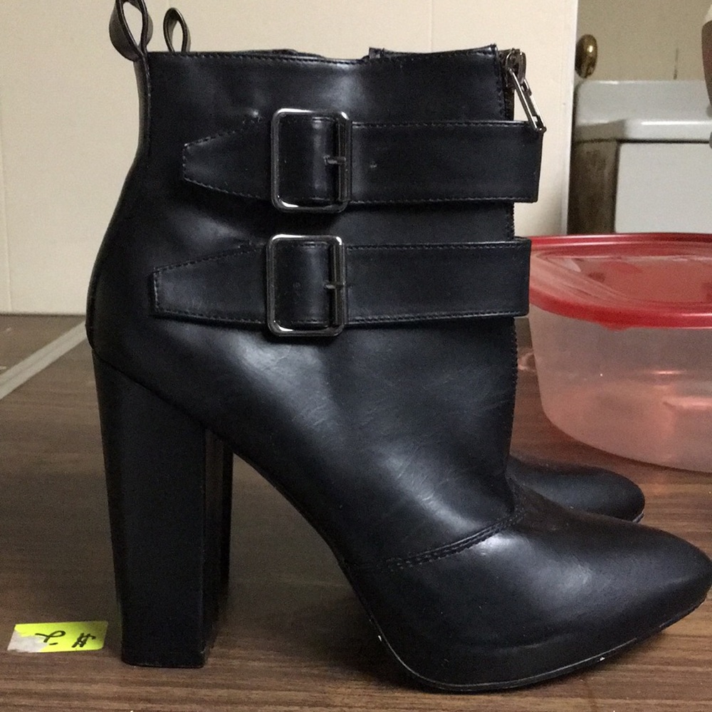 Heeled black booties